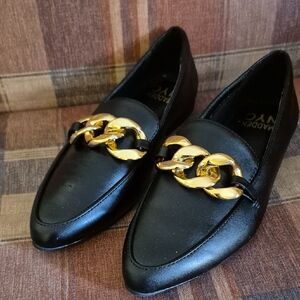 Chic Black Loafers with Gold Accent